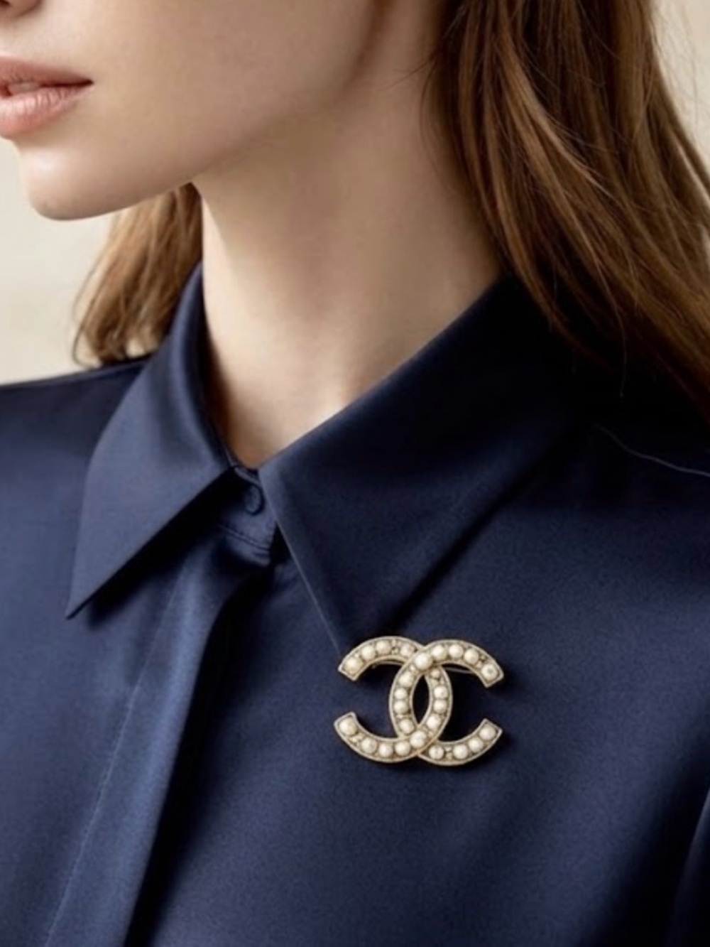 CHANEL Gold Pearl CC Logo Brooch on Navy Silk